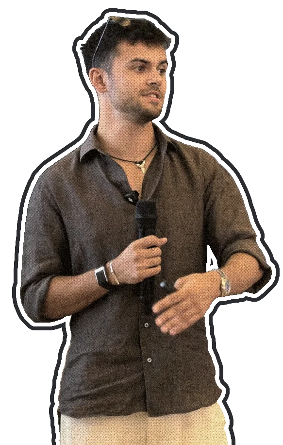 Ethan Monkhouse speaking, mic in hand